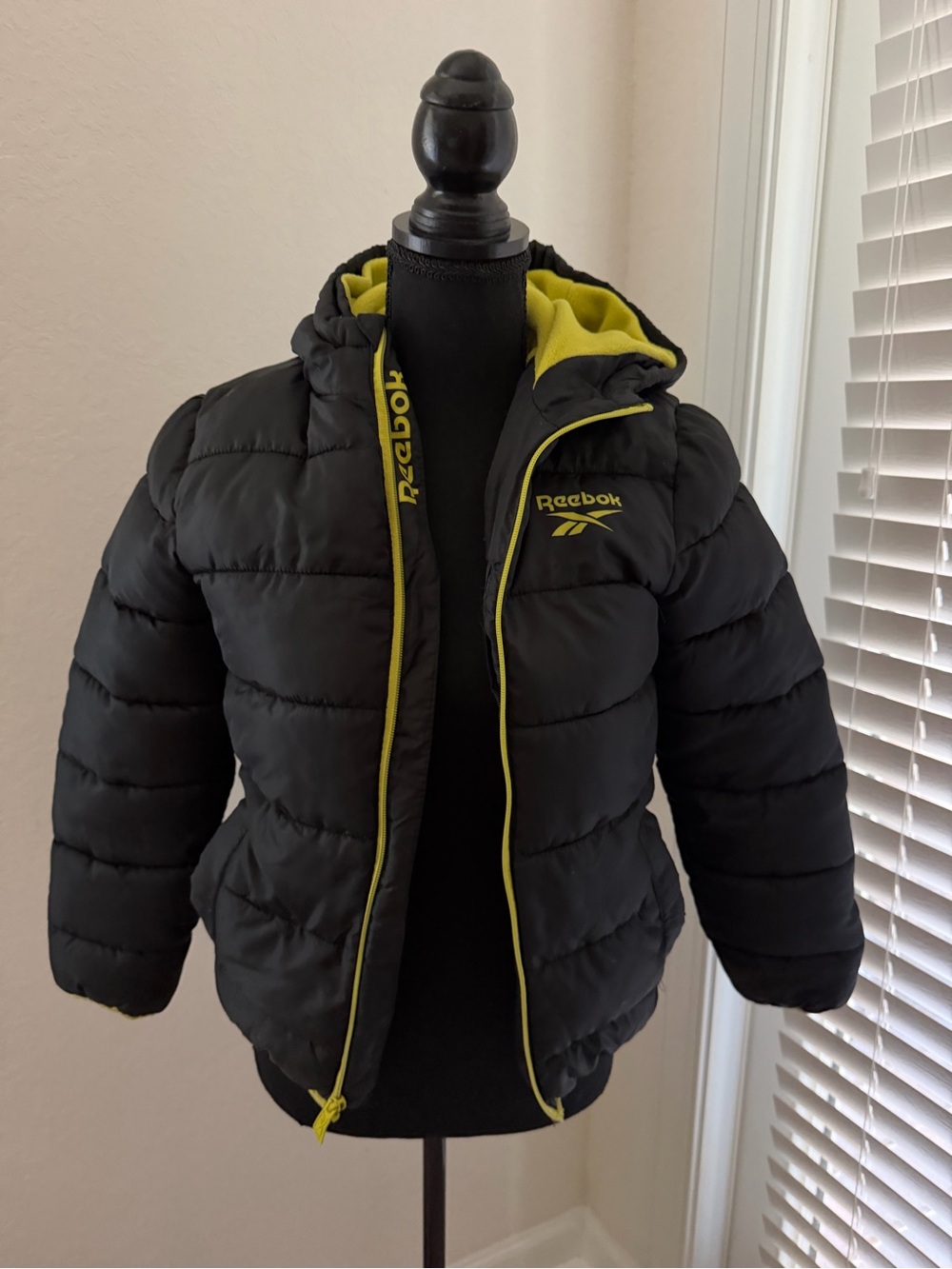 Reebok Kids Black Puffer Jacket with Yellow Trim